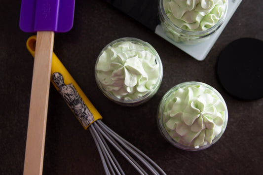 body butter in tubs with whisk and silicone spatula